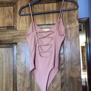 Never worn with tags open back bodysuit